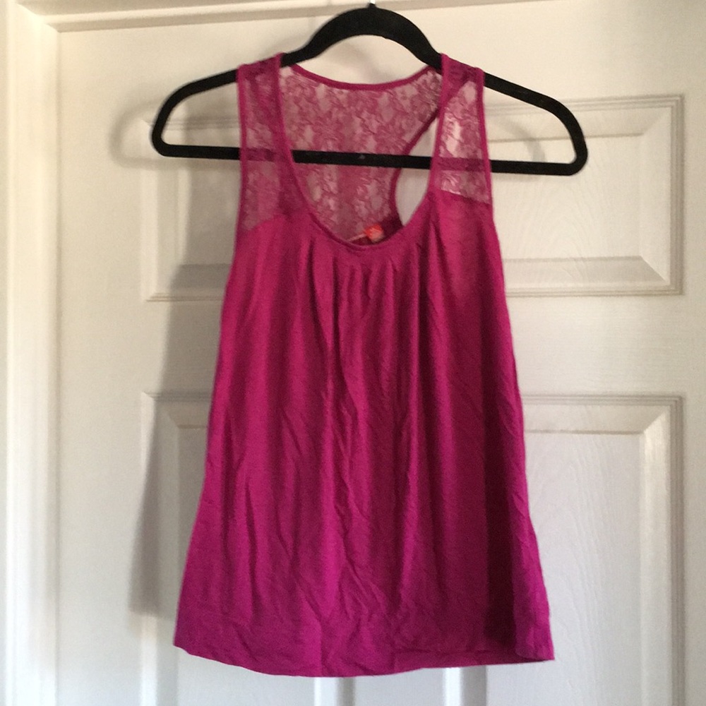 Woman’s bright pink lacey tank